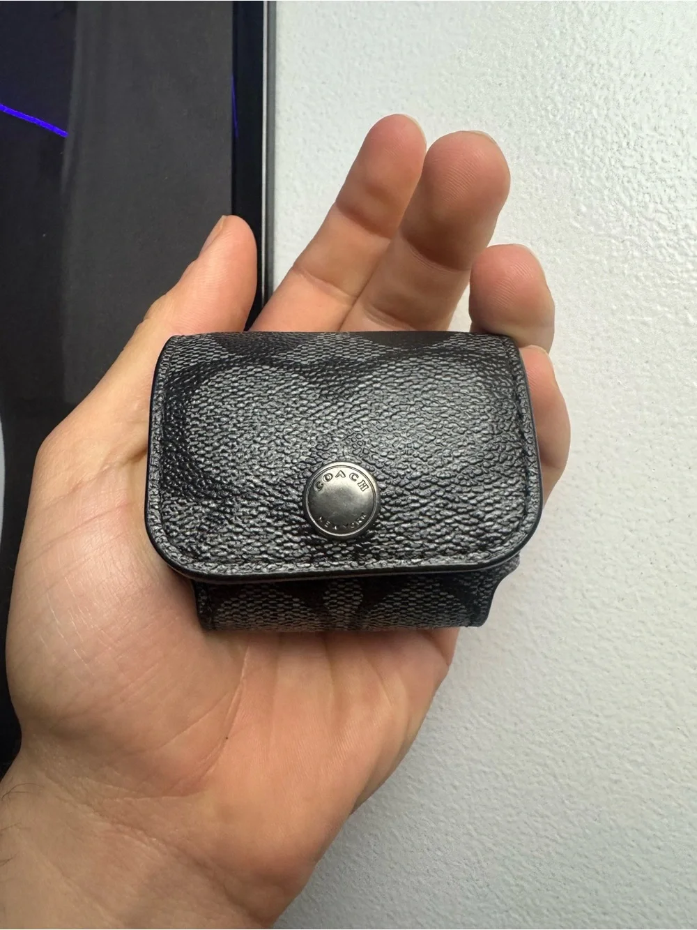 Coach Black Pebble Leather AirPods Case with Snap Closure